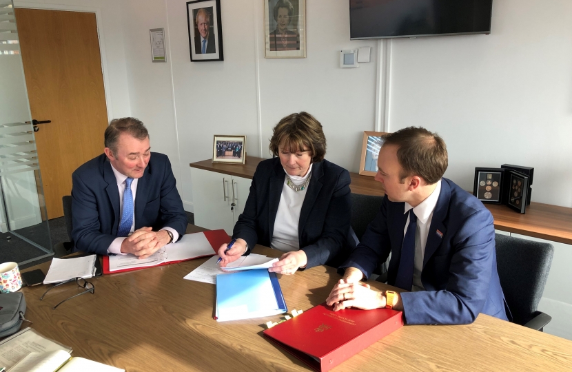 The photograph shows Secretary of State for Health Simon Hart MP )Right), with Shadow Health Minister Angela Burns AM (centre), and Secretary of State for Wales Simon Hart MP.